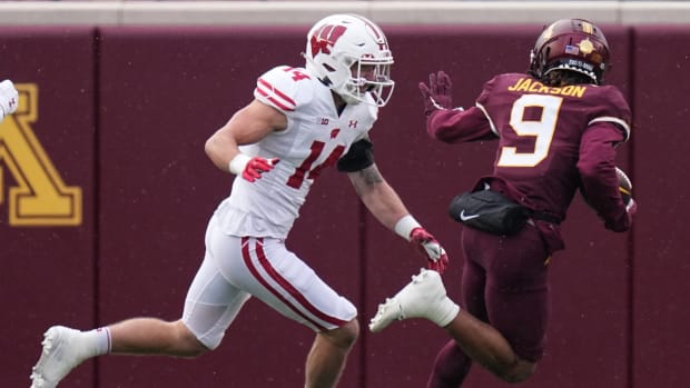 Nov 25, 2023; Minneapolis, Minnesota, USA; Minnesota Golden Gophers wide receiver Daniel Jackson (9) out runs Wisconsin Badgers safety Preston Zachman (14) to score a touchdown during the first quarter at Huntington Bank Stadium.
